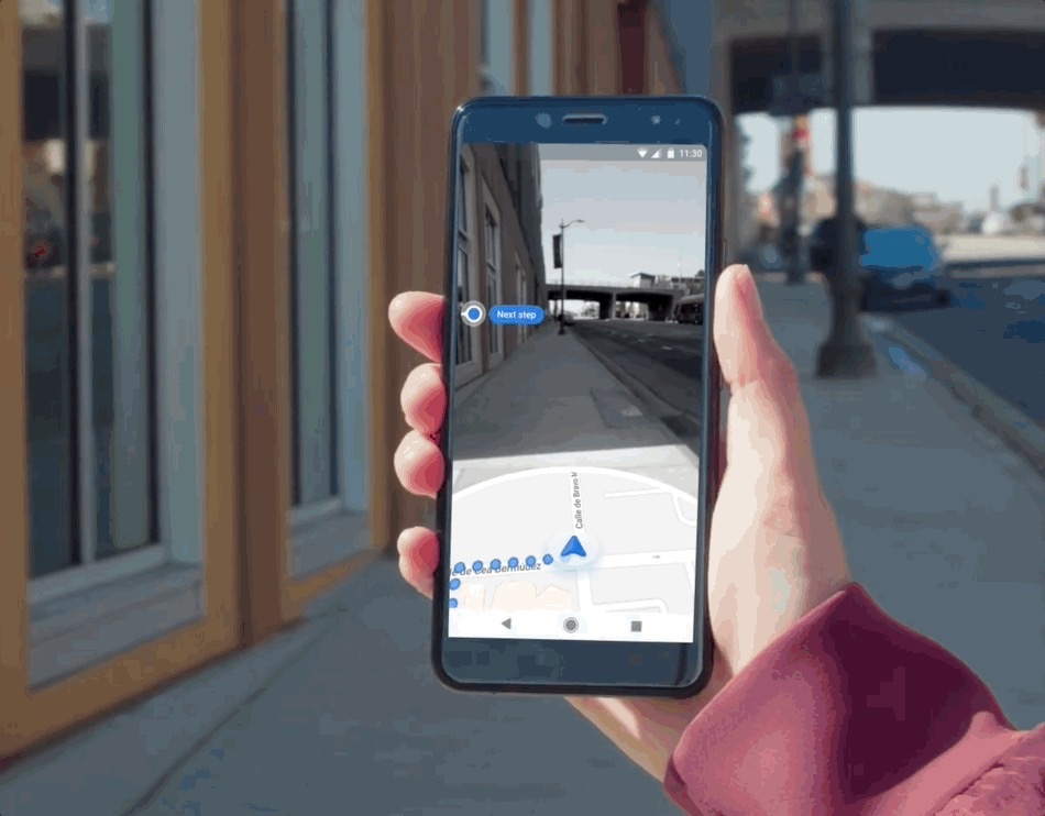 Live View AR walking navigation in Google Maps, with a waypoint marker in the camera view and a minimap below